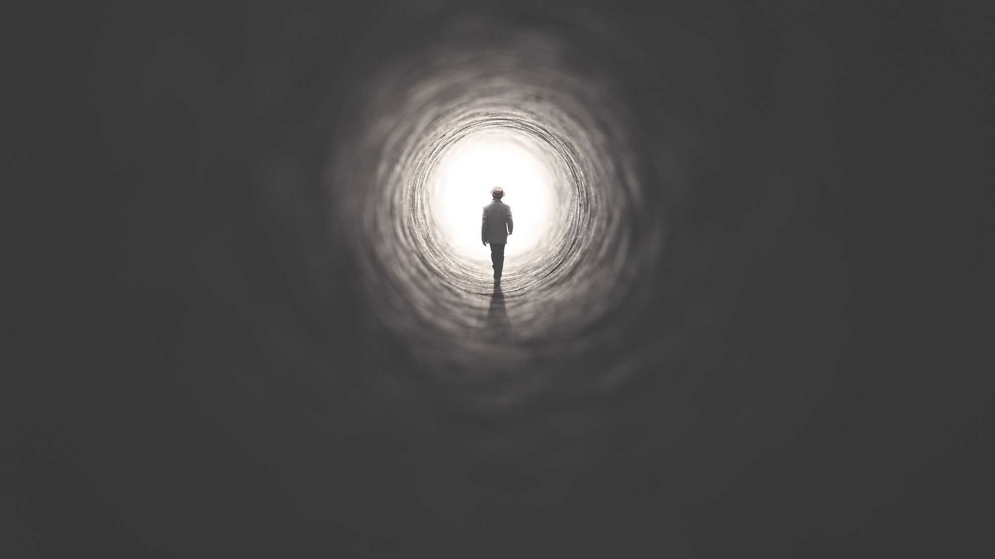Illustration einer Person welche in einen kreisrunden Lichtkegel läuft.
