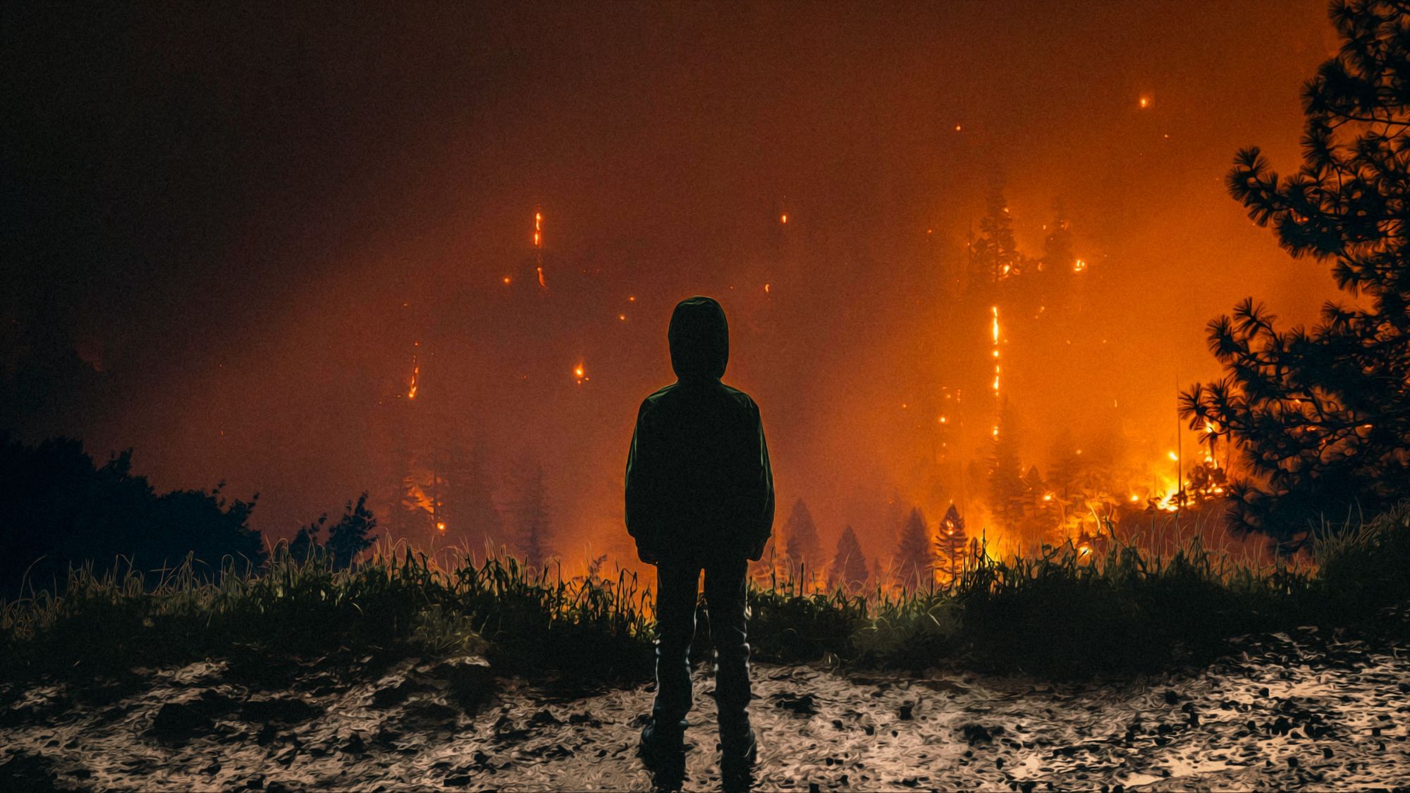 Fotomontage: Ein Kind steht auf einem Felsvorsprung und schaut hinab in ein Tal, in dem ein Waldbrand tobt.
