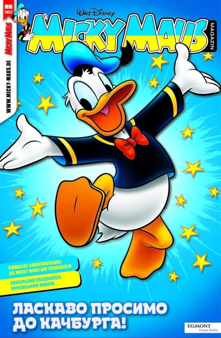 Eine Mickey Maus springt dem Lesenden von einem Magazincover entgegen, dass in den ukrainischen Nationalfarben blau und gelb gestaltet ist.